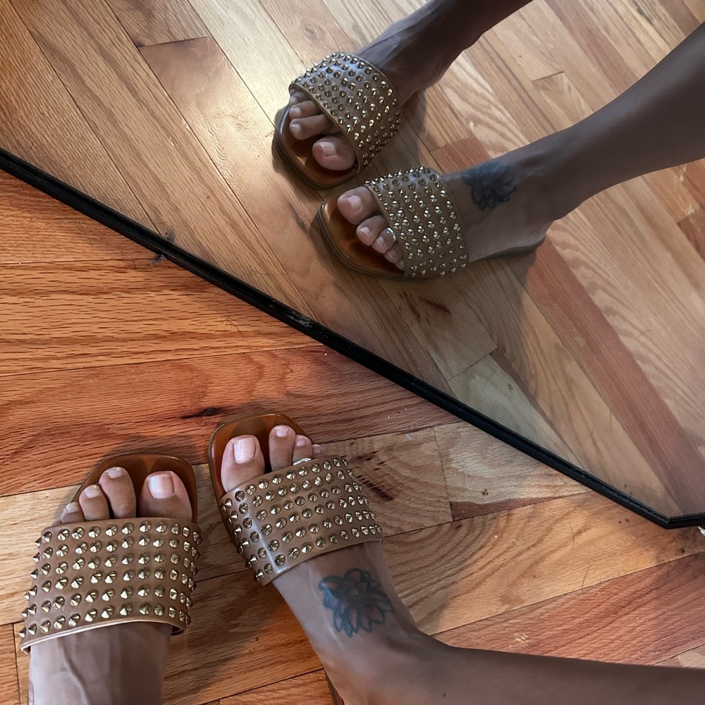 Tan slip ons with gold studs
